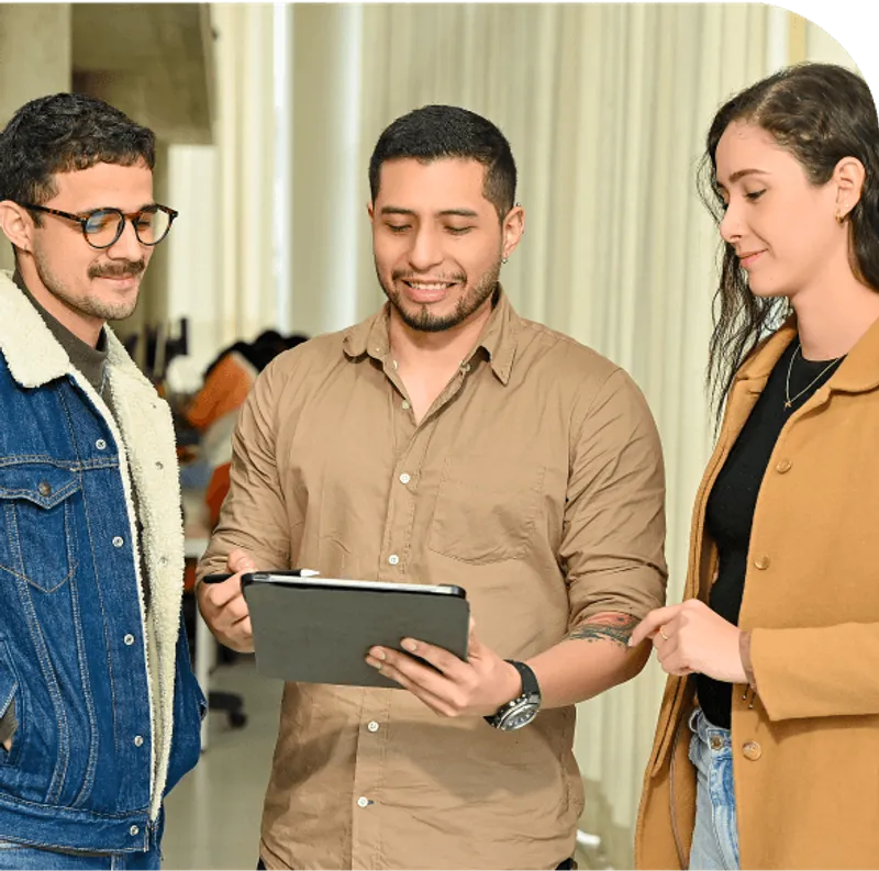 DuckWorks drafters reviewing a project on a tablet